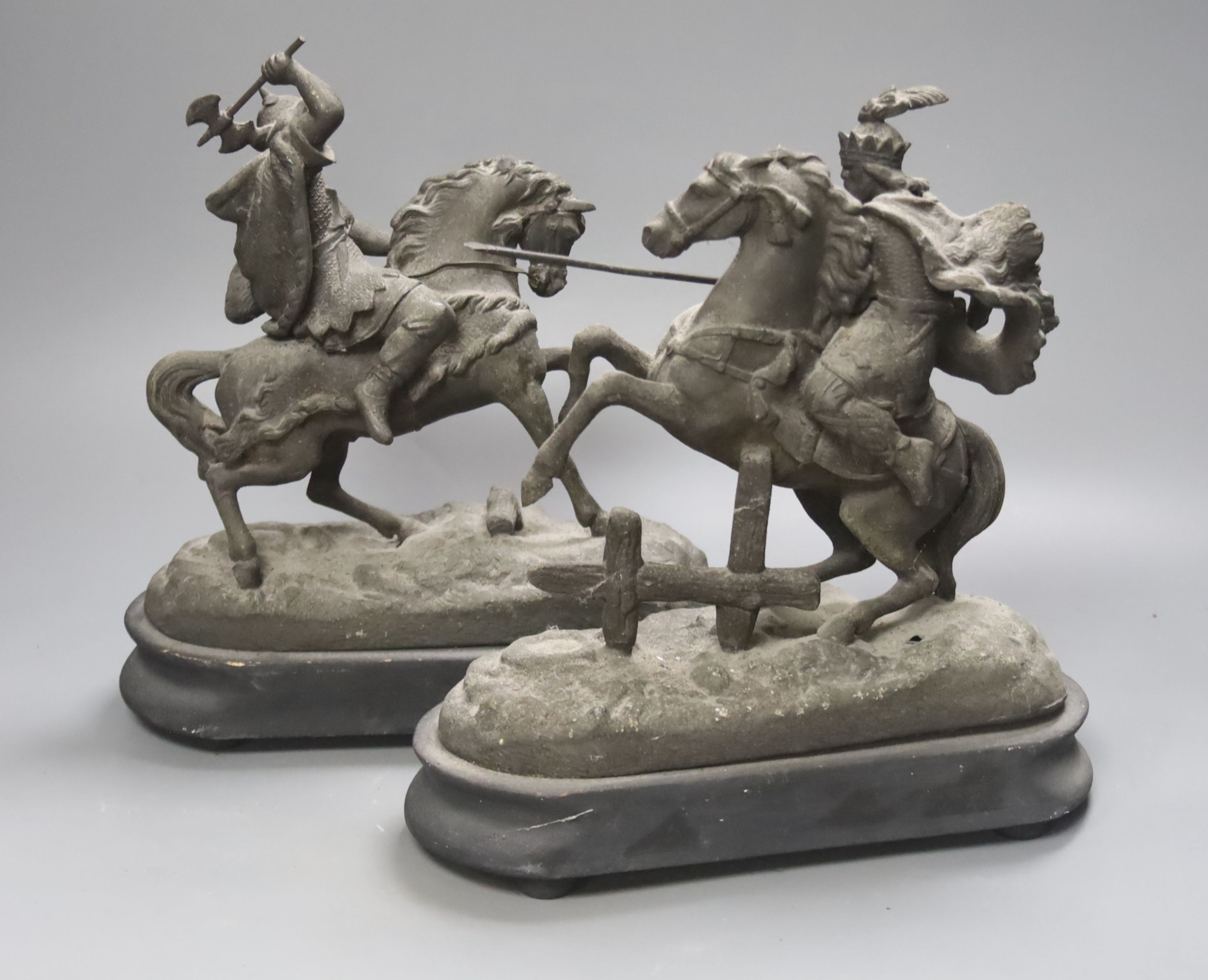 A pair of spelter figures on horseback